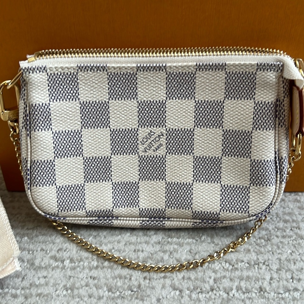 Louis Vuitton Damier Azur Mini Pochette. Brand new never used.